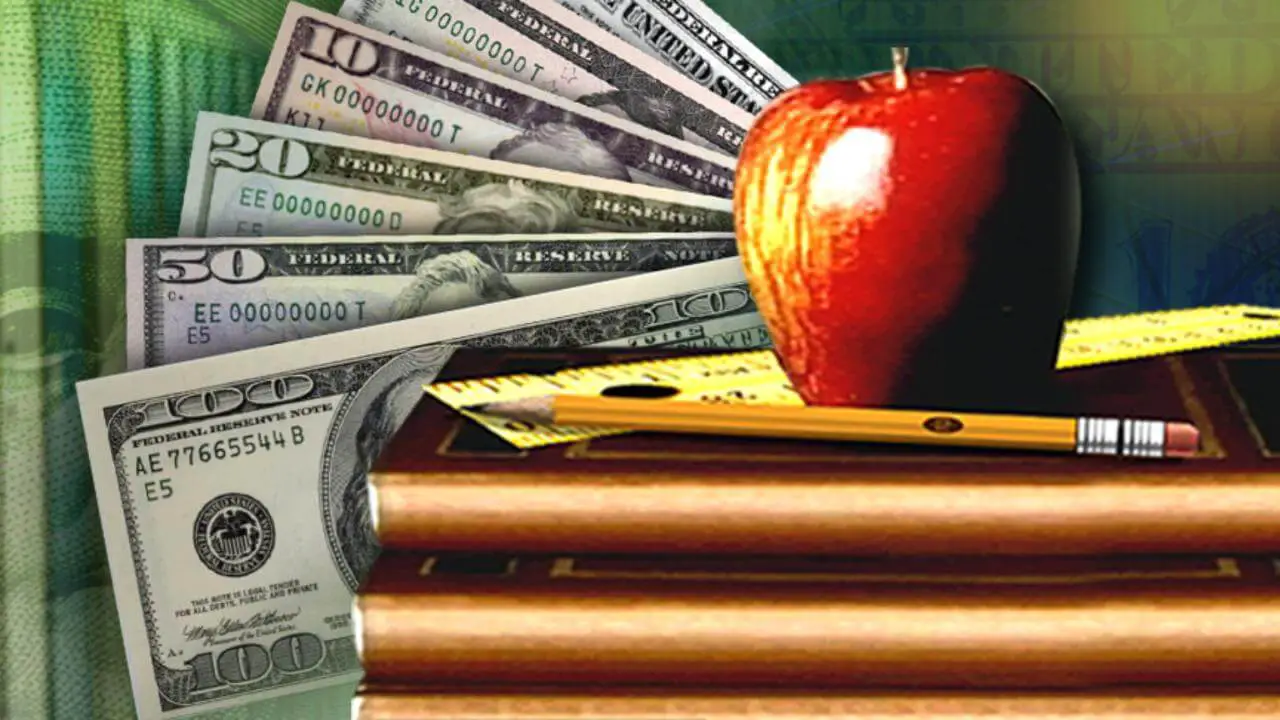 Image of money and an apple